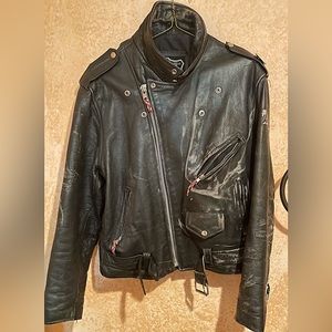 Vintage(1986) distressed leather motorcycle Jacket/ Sex Pistols on reverse.